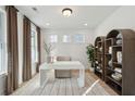 Well-lit home office with a modern desk, stylish shelving, and neutral decor at 729 Maynard Ln, Summerville, SC 29486