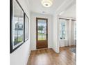 Welcoming entryway with hardwood floors, natural light, and stylish decor at 762 Maynard Ln, Summerville, SC 29486