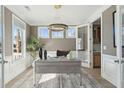 Well-lit office features a stylish desk and built-in cabinetries at 772 Maynard Ln, Summerville, SC 29486