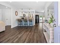 Open-concept kitchen featuring a breakfast bar, modern appliances, and seamless transition to living areas at 8767 Auburn Dr, North Charleston, SC 29406