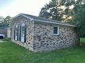 Exterior view of brick home showing windows with shutters and nice architectural details at 980 Margaret Dr, Ladson, SC 29456