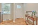 Bright foyer featuring hardwood floors and elegant decor at 110 Clubhouse Rd, Summerville, SC 29483