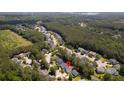 Aerial view of a home nestled within a lush, green neighborhood at 207 Breckingridge Dr, Ladson, SC 29456