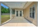 Covered patio area with a pergola, ideal for outdoor dining and entertaining at 412 Beverly Dr, Summerville, SC 29485
