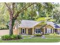 Well-maintained home showcasing a lush yard and mature trees in a residential neighborhood at 703 Temple Rd # A, Ladson, SC 29456
