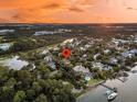 Gorgeous neighborhood featuring waterfront views and stunning homes nestled among lush trees at 401 Ralston Creek St, Charleston, SC 29492