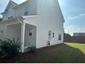 This is a view of the side yard with nice green grass at 4126 O'Hear Ave, North Charleston, SC 29406
