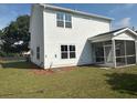 A view of the backyard with a screened in porch at 4126 O'Hear Ave, North Charleston, SC 29406