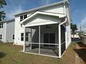 A screened in porch with a ceiling fan at 4126 O'Hear Ave, North Charleston, SC 29406