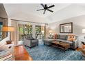 Inviting living room with stylish furnishings, hardwood floors, and sliding glass doors to a patio at 5558 Green Dolphin Way, Kiawah Island, SC 29455