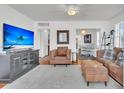 Spacious living room with hardwood floors, ample natural light, and stylish furnishings at 727 Savannah Hwy, Charleston, SC 29407