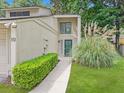 This home's front entrance showcases a well-manicured walkway and tasteful landscaping at 10 Stallion Ct, Charleston, SC 29407