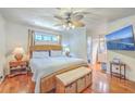 Cozy bedroom featuring wood floors, a ceiling fan and en suite bathroom at 106 Nottingham Ct, Summerville, SC 29485