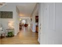 Inviting entryway with hardwood floors and an open view of the living spaces at 1551 Ben Sawyer Blvd # 4D, Mount Pleasant, SC 29464