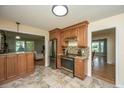 Open concept kitchen featuring stainless steel appliances and a view of the living and dining areas at 2847 Limestone Blvd, Charleston, SC 29414