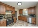 Well-equipped kitchen featuring stainless steel appliances, granite countertops, and tiled backsplash at 2847 Limestone Blvd, Charleston, SC 29414