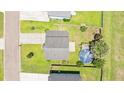 Aerial view of the property featuring a pool, surrounding neighborhood, and ample green backyard space at 302 Mossy Wood Rd, Summerville, SC 29483