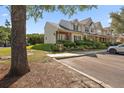Inviting townhomes, landscaped grounds, and convenient parking spaces at 312 Kelsey Blvd, Wando, SC 29492