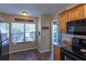 Bright kitchen with modern appliances, wooden cabinets, and a cozy breakfast nook at 7322 Stoney Moss Way, Hanahan, SC 29410