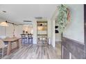 Bright entryway featuring a wooden table set, dining room, and decorative wreath at 422 Geddes Ave, Charleston, SC 29407