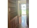 Hallway with built-in shelving and an exterior view through the front door at 874 Evans Rd, Charleston, SC 29412