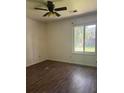 Bedroom featuring wood floors, a window, and ceiling fan at 106 Teddy Ct, Summerville, SC 29485