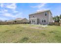 Spacious backyard with a well-maintained lawn and a wooden fence, perfect for outdoor activities at 134 Ivory Shadow Rd, Summerville, SC 29486