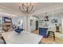 Open-concept kitchen featuring modern appliances and a stylish island with seating at 15 Dewey St, Charleston, SC 29403