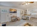 Inviting living room featuring a wall-mounted TV, comfortable seating, and a charming coastal aesthetic at 1617 Refuge Run, Charleston, SC 29412