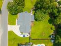 Aerial view shows house, large fenced yard, deck, boat parking, and mature landscaping at 2005 Thornhill Dr, Summerville, SC 29485