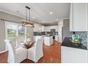 Eat-in kitchen featuring granite countertops, stainless steel appliances, and an island with a view at 364 Deep River Rd, Summerville, SC 29486