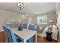 Bright living and dining area featuring hardwood floors, neutral walls, and a large window at 364 Deep River Rd, Summerville, SC 29486