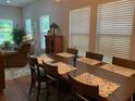 Bright dining room with ample natural light, a dining table, and comfortable seating at 3808 Tupelo Branch Row, Mount Pleasant, SC 29429