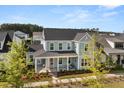 Beautiful two-story home with a spacious front porch and well-maintained landscaping at 113 Jackson Pond Ct, Summerville, SC 29486