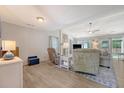 Cozy living room area with neutral furniture, and a view of the fireplace at 138 Wainwright Manor, Summerville, SC 29485
