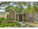 Beautifully landscaped condo complex with brick exteriors and mature trees at 1872 Montclair Dr # C, Mount Pleasant, SC 29464