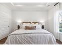 Comfortable bedroom featuring plush bedding, modern lighting, and soothing neutral tones at 1009 Sagegrass St, Summerville, SC 29485