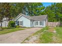 Beautiful single-story home features a well-manicured lawn, a concrete driveway, and light blue siding at 8108 Halifax Way, North Charleston, SC 29420