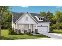 Charming craftsman style home with stone accents and a two-car garage at 1892 Nola Run Run, Summerville, SC 29485