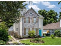 Two-story brick home with landscaped yard and driveway at 924 Provincial Cir, Mount Pleasant, SC 29464