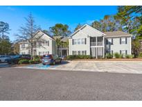 Two-story apartment building with ample parking at 1505 Whitby Ln, Charleston, SC 29414