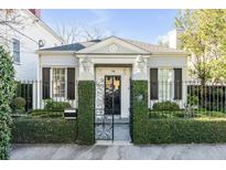 Charming single-story home with a classic facade and gated entry at 79 Alexander St, Charleston, SC 29403