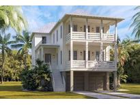 Two-story home with double garage and front porch at 9005 Stern Aly, Johns Island, SC 29455