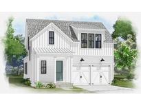 Two-story farmhouse with white siding, three-car garage, and landscaping at 304 Trailmore Ln, Summerville, SC 29486
