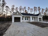 Two-unit craftsman style home with attached garages and front porches at 964 Dusk Dr, Summerville, SC 29486