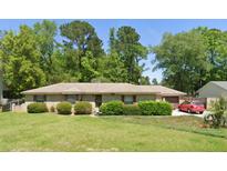 Brick ranch home with spacious yard and mature trees at 230 Smythe Dr, Summerville, SC 29485