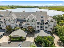 Luxury waterfront community boasts stunning views and resort-style amenities at 1551 Ben Sawyer Blvd # 6-I, Mount Pleasant, SC 29464