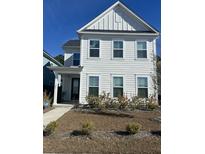 Two-story white house with a black front door and landscaping at 106 Helena Park Dr Dr, Summerville, SC 29486