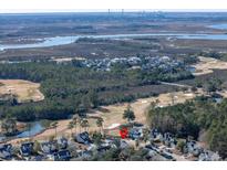 Aerial view of home on golf course with water access at 1800 Palmetto Isle Dr, Mount Pleasant, SC 29466