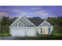 Two story home with gray siding, white trim, and three car garage at 211 Bilge Rd, Ridgeville, SC 29472